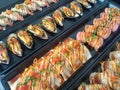 orderly various seafood sushi sets, oriental Japanese nigiri sushi - salmon, shell, shrimp; Food background